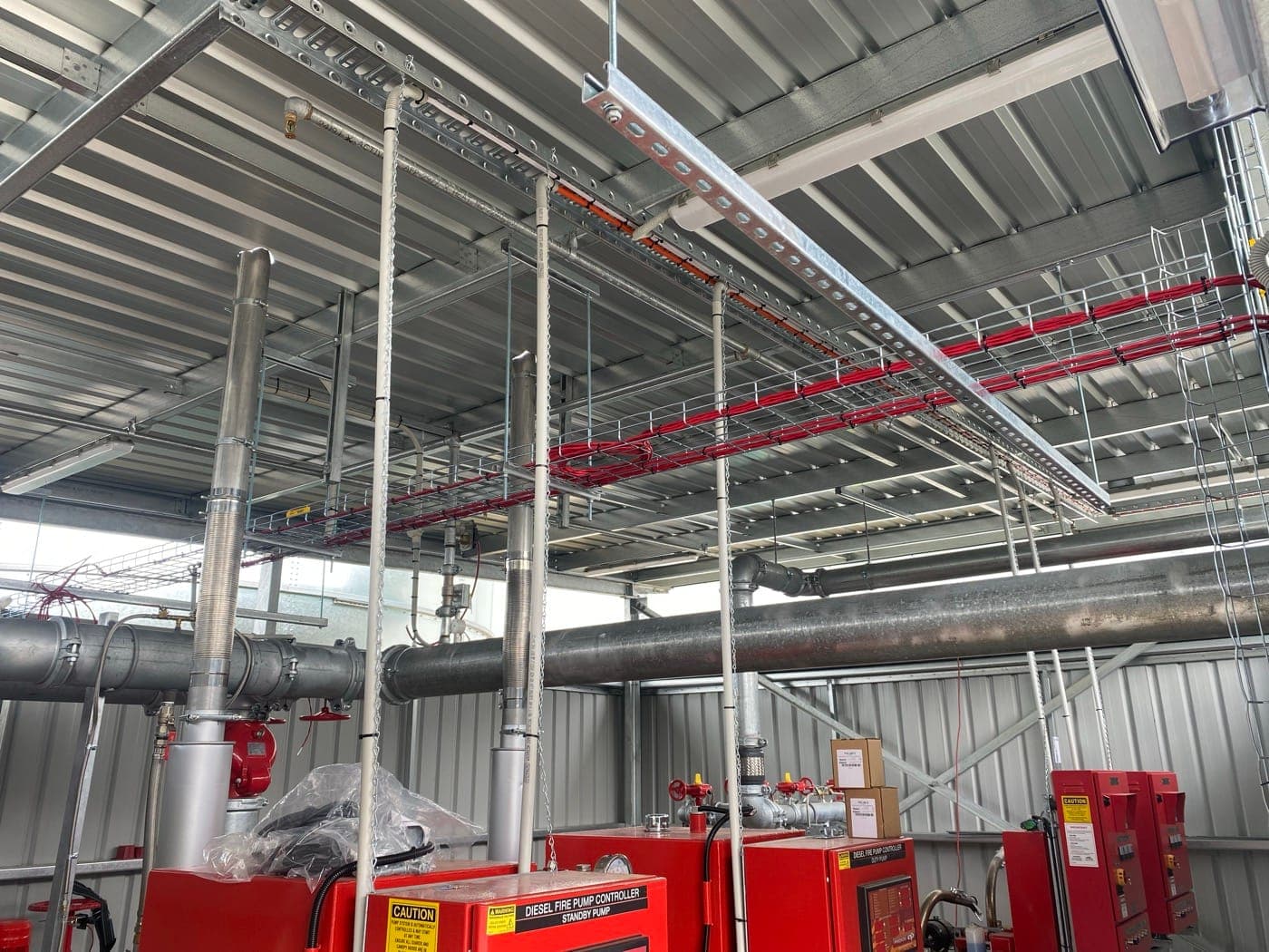 Fire pump room pipework and cable trays