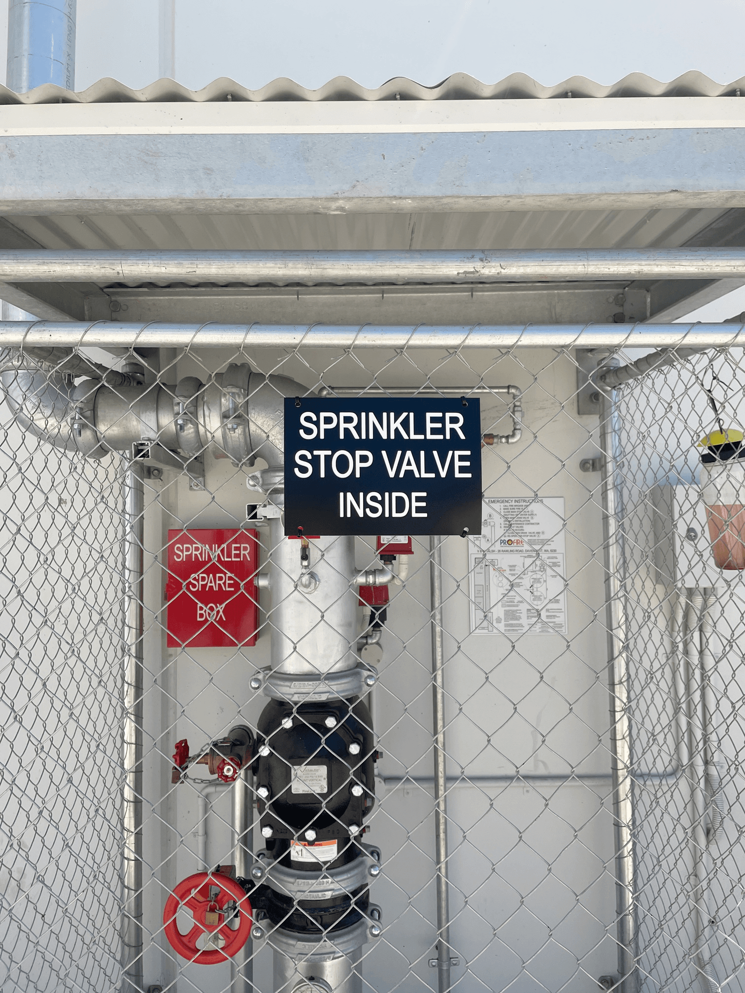 Sprinkler stop valve enclosure