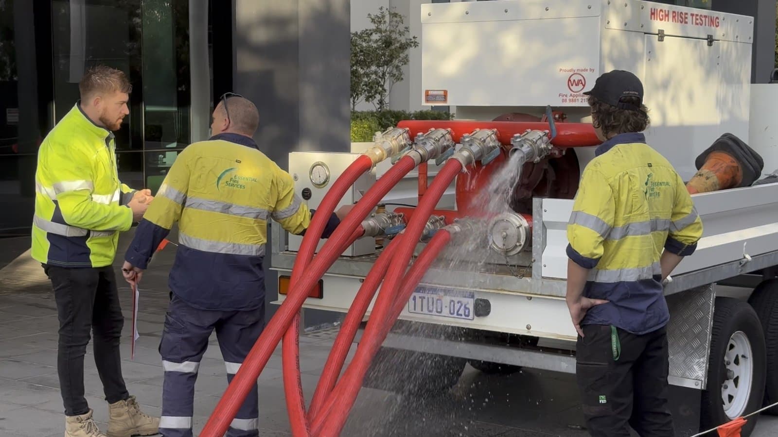 EFS team testing fire systems in a high-rise building